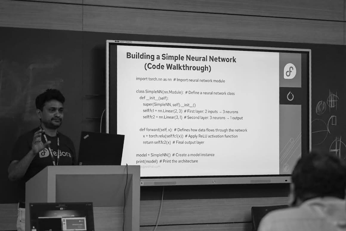 man speaking at a conference